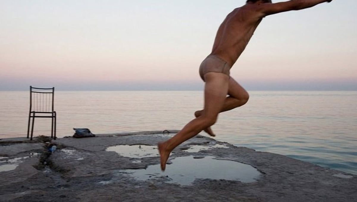 A young man diving into the Black sea, Ukraine. From the series "From the Mountains and to the Sea" © Nadia Sablin