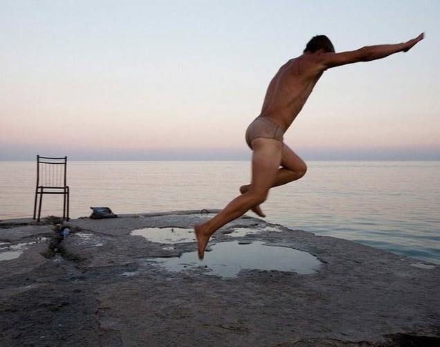 A young man diving into the Black sea, Ukraine. From the series "From the Mountains and to the Sea" © Nadia Sablin