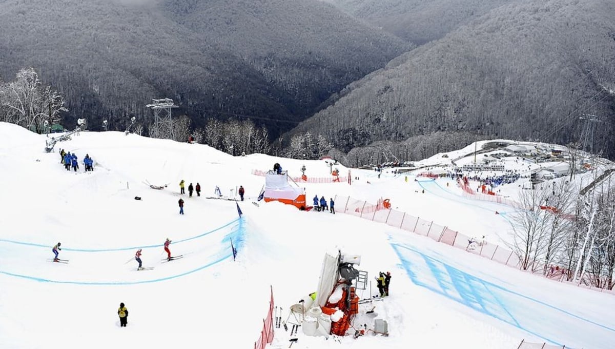 Sportsmen compete during the Ski cross of Snowboarding and Free Style World Cup Test Event at the Snowboard and Free Style Centre in Rosa Khutor near the Russian Black Sea resort of Sochi.