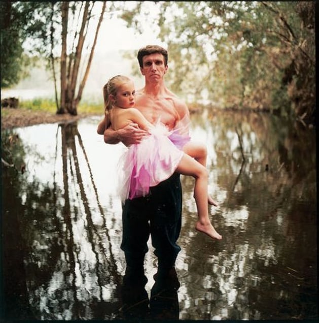 Angelina with Her Father, Israel, 2005, from Strangely Familiar by Michal Chelbin, Aperture 2008 © Michal Chelbin