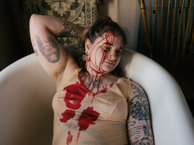 Lois bleeding in her parents’ bathtub