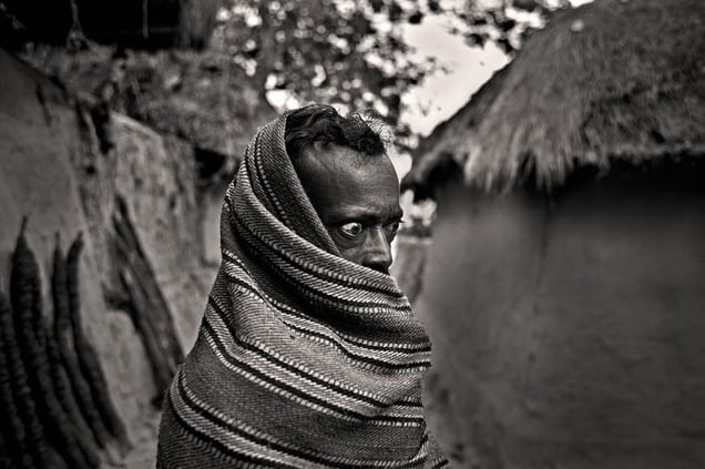 Hiromunda used to be a farmer, tending to miles of rice fields. Encroaching shrimp farms have left him unable to feed his family. Patrakhola, Satkhira. © Munem Wasif/VU'