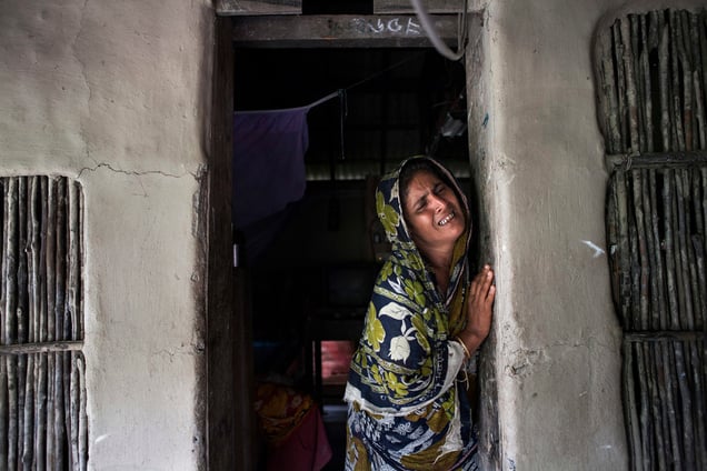Rizia(40), her husband Mazed Gain killed by tiger attack in 2012, she has three children. Thousands of men and women go into the Sundarbans forest in Southern Bangladesh every day to gather honey, collect firewood, or catch fish, crabs and putting themselves at great risk for a tiger attack.