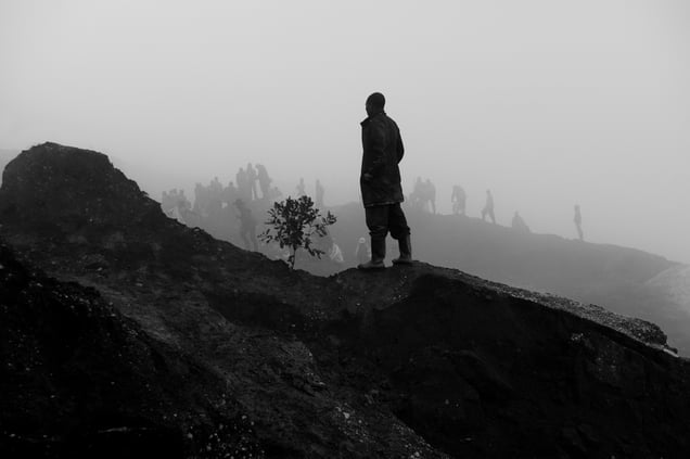 Rubaya, Democratic Republic of the Congo. Sunrise in Rubaya in the East ofDemocratic Republic of the Congo. The miner begins the journey to work at mines © Judith Prat