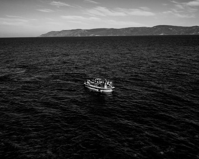 Migrants reaching the Greek island of  Lesvos - Crossings Exhibition