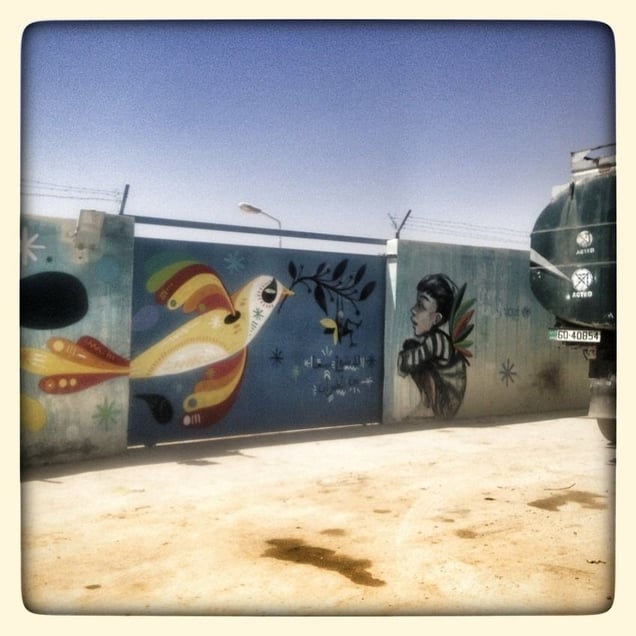 Artwork lines the walls of a water distribution centre.