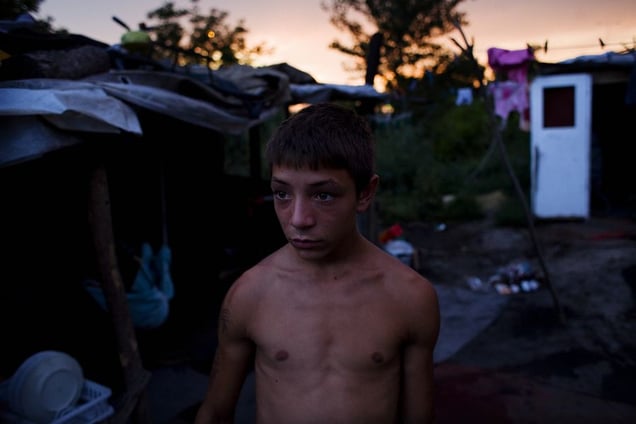 A young man in the Stara Gazela camp. © Matt Lutton