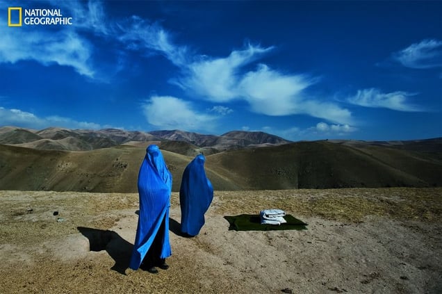 Noor Nisa, about 18, was pregnant and her water had just broken. Her husband was determined to get her to the hospital, but his car broke down. The photographer ended up taking Noor Nisa, her mother and her husband to the hospital, where she gave birth to a baby girl.  From the October 125th anniversary issue of National Geographic magazine © Lynsey Addario/National Geographic