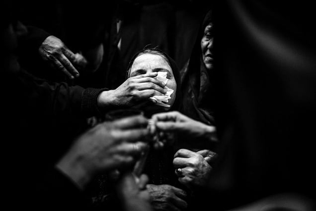 Ms Saltanat lak (65) mother of martyrs Amrollah (15) After 32 years waiting heard about her son body ,  last moment that mother say good bye to her son . amrollah identity with a DNA test was determined
