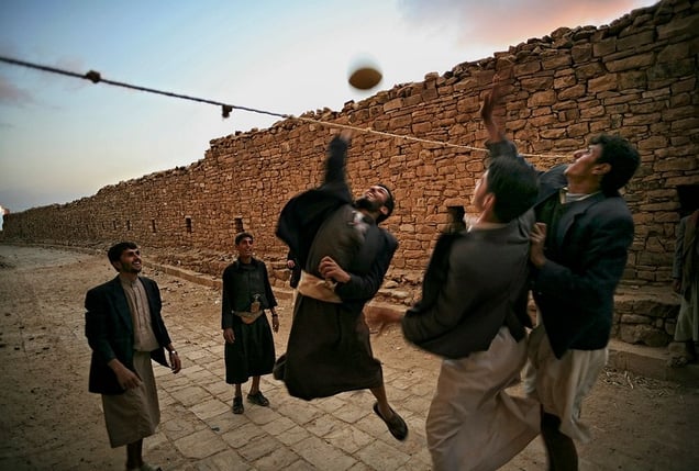 Thula, Yemen: Young boys playing volleyball in the quiet streets of the historic town. © Matjaz Krivic