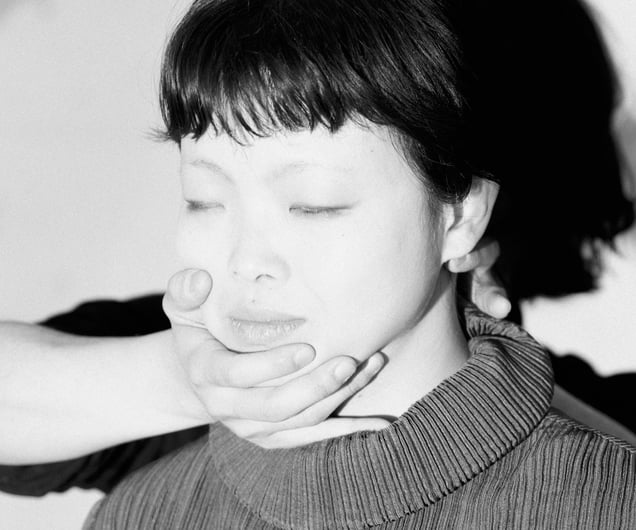 A Girl With Her Eyes Closed