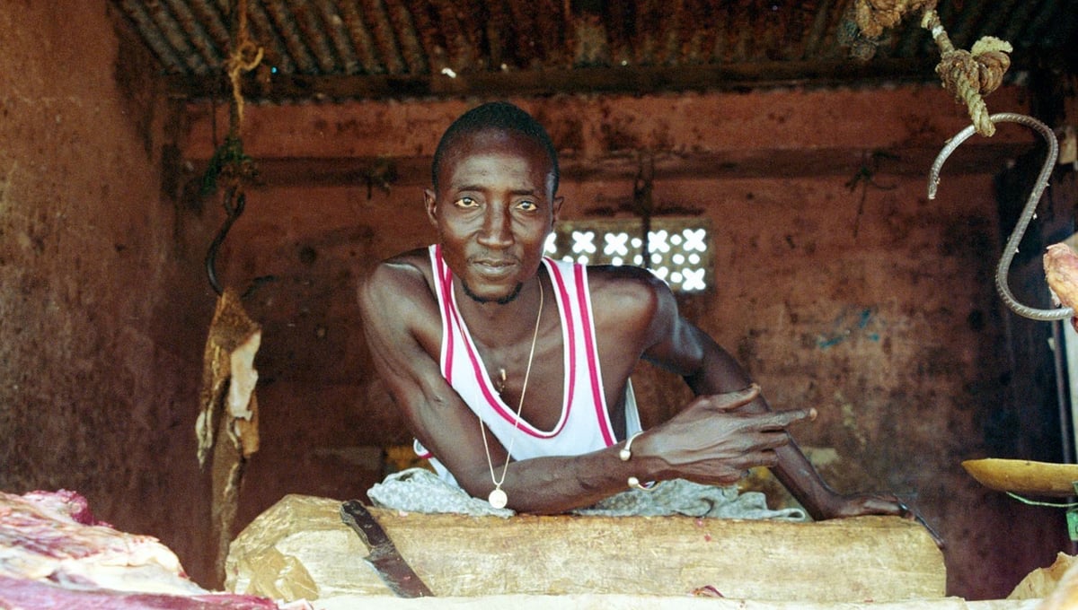 Although he lives in an outlying suburb, and enjoys a much more traditional life than his counterparts who live or work in central Dakar, this butcher's old school style looks like it might have been lifted directly from an early 1980s music video.