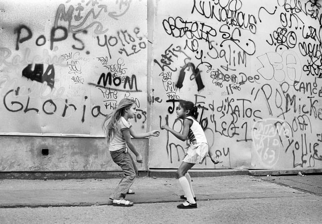 Girls dancing to disco music coming out of a nearby bar, Lower Eastside, Manhattan, 1978 © Martha Cooper