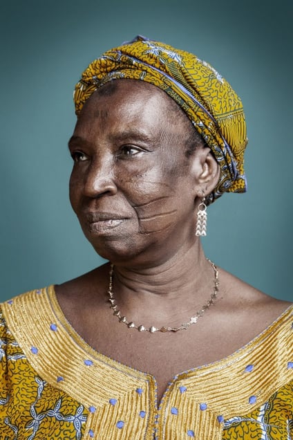 Ms. K. Benin : “People would go in groups to get their scarifications, and I went with my friends…" © Joana Choumali