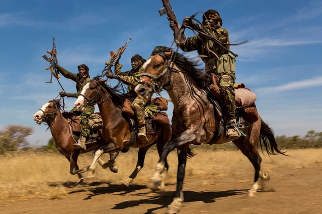 Rangers exhibit their riding skills as they return to Zakouma National Park after weeks on elephant patrol. Zakouma, Chad, 07 January 2015.