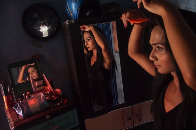 Angel combing her hair