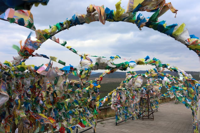 Prayer flags flutter at a Mogolia-style temple near a cemetery in Ulan-Ude, Republic of Buryatia on May 17, 2024.