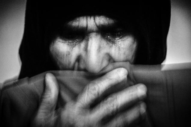 All mothers are crying for their sons ... They do not know about their sons. Where is the sons' bodies? Many mothers For crying Lost her sight .Anbar Jaberi (72), who has waited 23 years for news of her son Nematollah, weeps over his old clothes