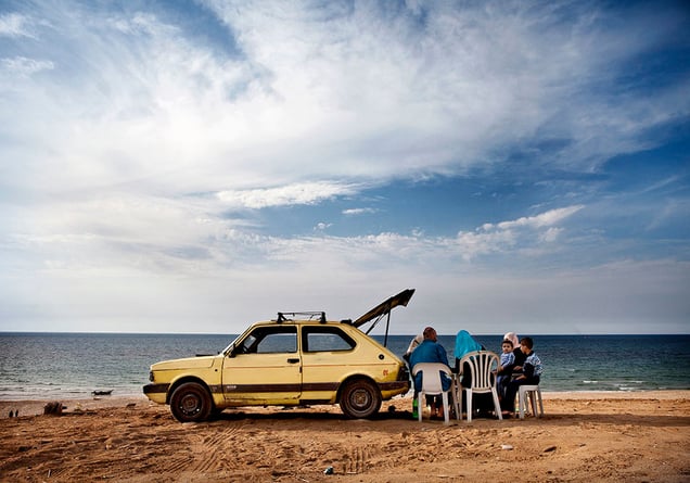 A family in Gaza City enjoys a picnic on the beach.