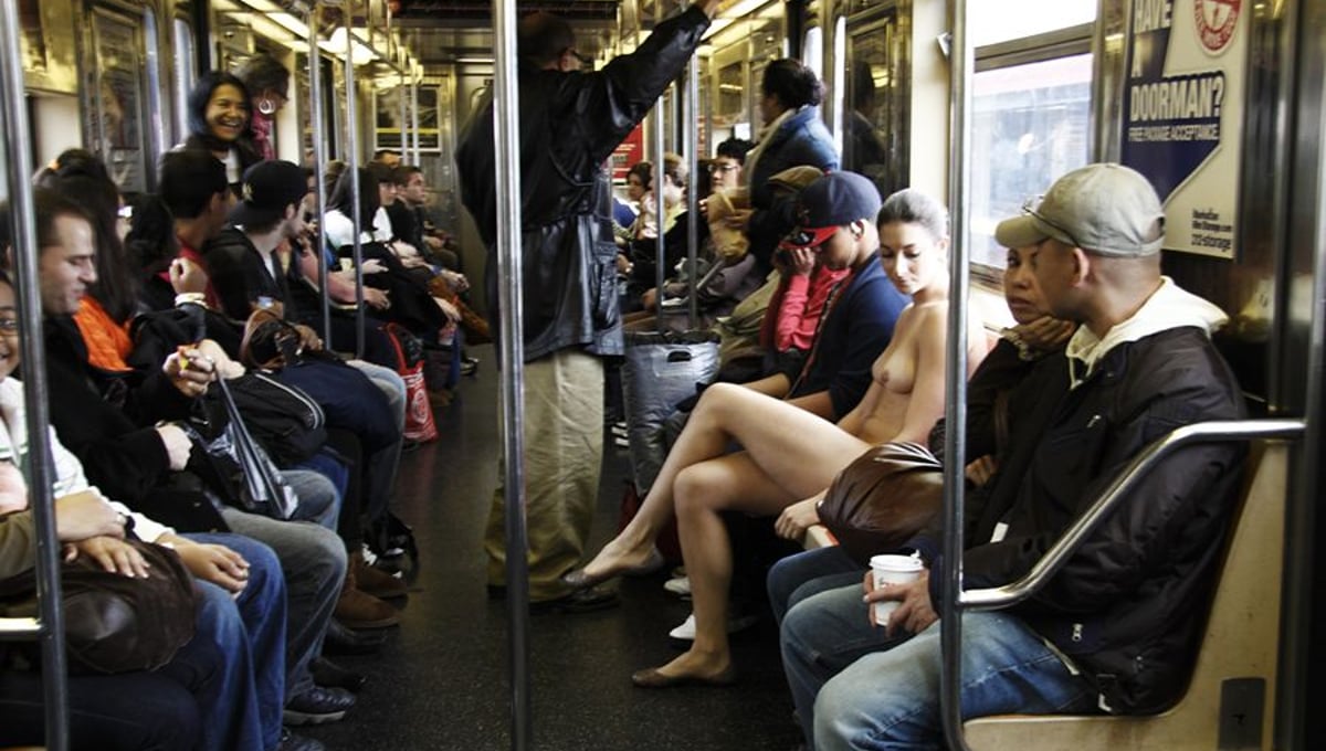 1 to the Bronx. From the series, Nue York: Self-Portraits of a Bare Urban Citizen, © Erica Simone