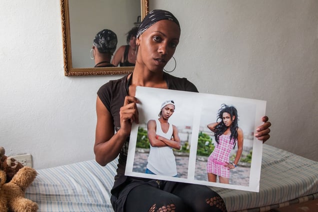 Natalie, with two self-portraits, Havana © Mariette Allen