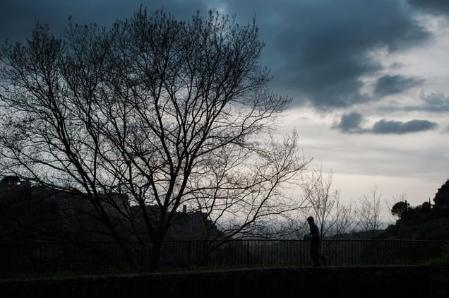 The way back home. Sometimes a game, a ball, and a little light heartedness are enough to make a difference. © Fabio Moscatelli
