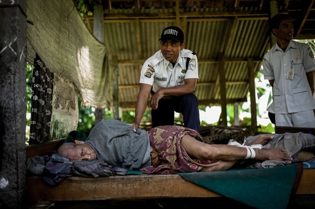 Indonesia, North-Bali,  18. April 2013 - Ketut is sitting on a bamboo lounger at the edge of the village, he sits there for 19 years. Previously Ketut was a construction worker once, he left his hut in the morning, in the evening he returned. A big man with strong hands, he brought money, he fed the family. © Christian Werner