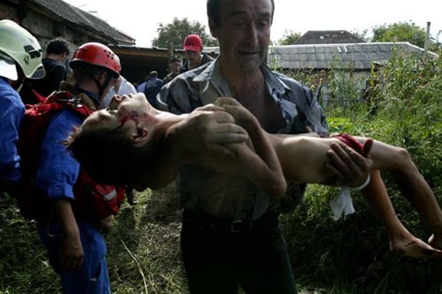2nd prize Spot News Stories © Yuri Kozyrev, Russia, Time Magazine, Beslan school siege, North Ossetia, Russia. On September 1 a group of Chechen militants occupied School Number One in the town of Beslan, in the neighboring Russian province of North Ossetia.