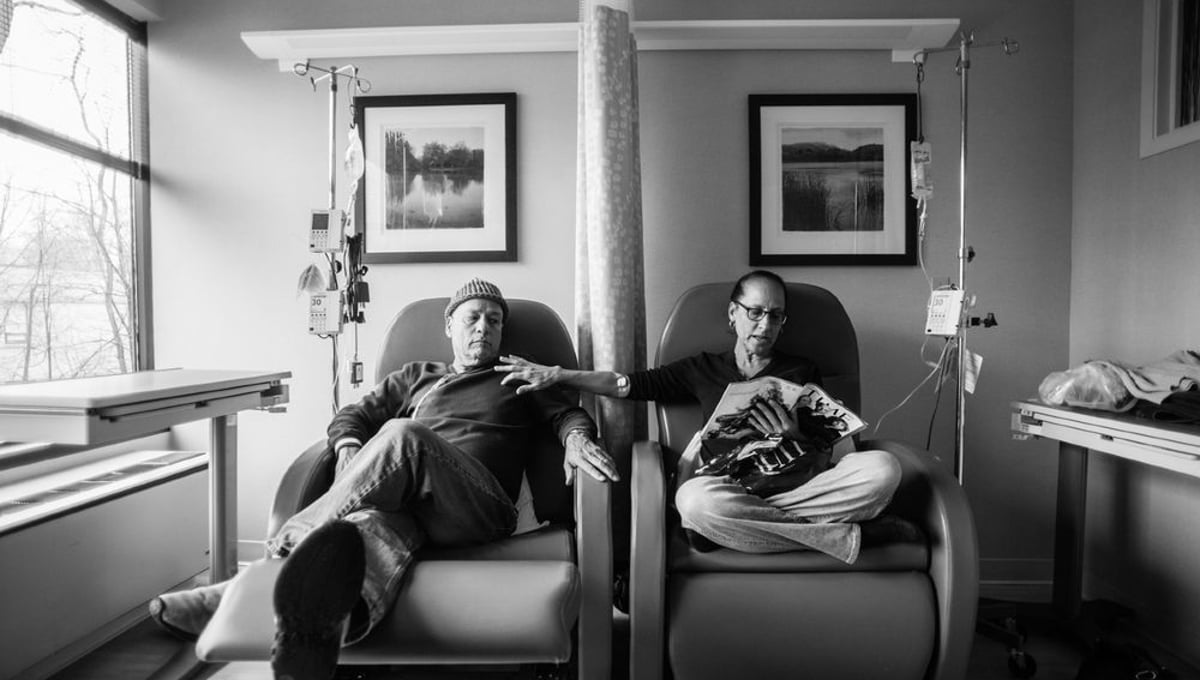 Howie calls these “his and hers” chairs. He sits beside Laurel, his wife of thirty-four years, as they get their weekly chemotherapy treatments, side by side at Oncologist Dr. Barry Boyd’s office. Greenwich, Connecticut. January, 2013 © Nancy Borowick