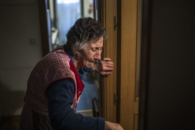 Carmen Martinez Ayuso (85) lost her apartment under foreclosure when her son lost his job and she could not pay the mortgage and high interest rates. Activists protested and clashed with riot police, but she was still evicted. Madrid, Spain, Friday, November 21, 2014. © Andres Kudacki / AP