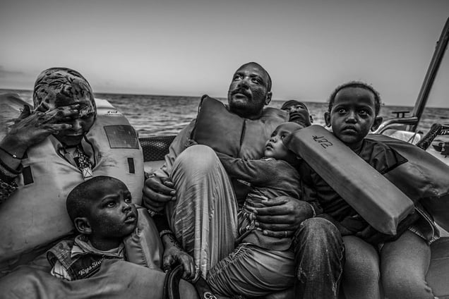 A Sudanese family moments after being rescued by the MOAS team
