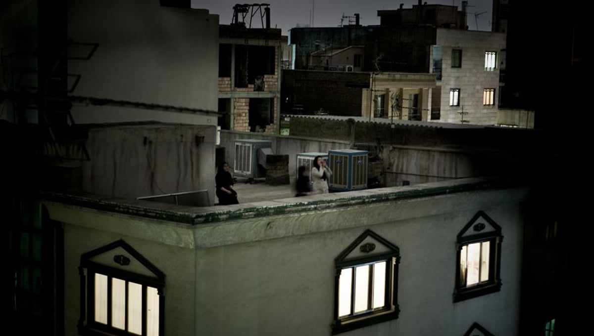 World Press Photo of the Year 2009. © Pietro Masturzo, Italy. From the rooftops of Tehran, June