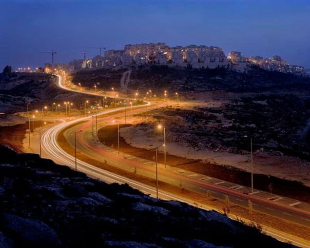 Har Homa, one of the newest illegal settlements built to encircle Jerusalem. The settlements almost always occupy the hilltops. From "Forensic Traces of War" © Simon Norfolk