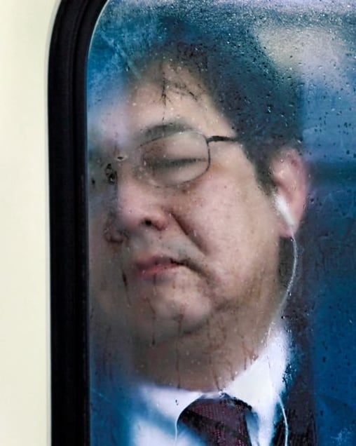 From the book and series, "Tokyo Compression" © Michael Wolf