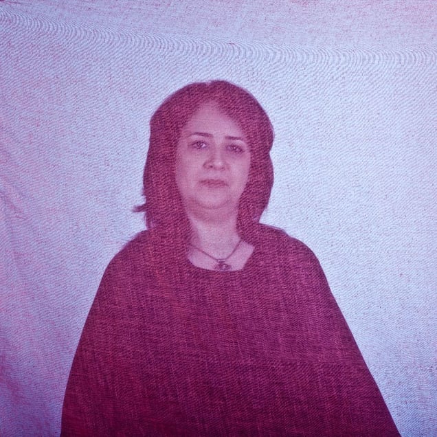 Fereshteh, an Iranian woman is photographed through the fabric of her hijab (the Islamic headscarf worn by women in the presence adult men who are not members of her immediate family). Since the Islamic revolution in 1979, Iranian women are not allowed to be seen in public without proper Islamic head dress in Iran. Not wearing a proper hijab is illegal and can result in arrest by a special police