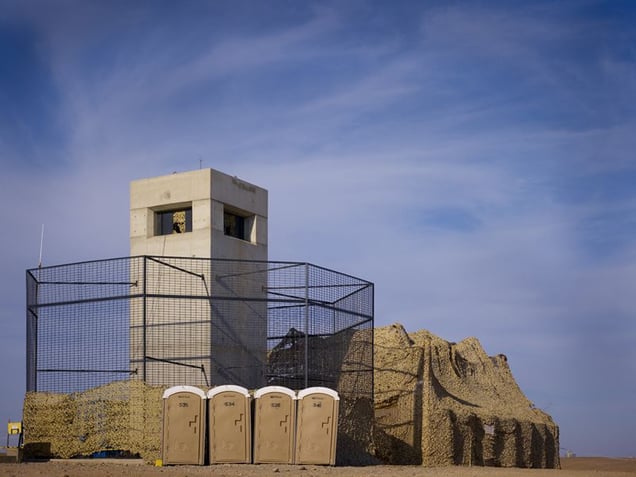 Watchtowers on the perimeter of Camp Bastion. © Simon Norfolk.