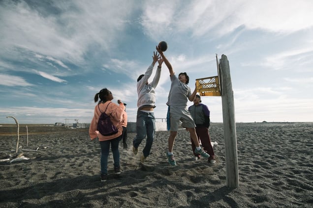 Teenagers from all over the North Slope villages attend summer camp at Shooting Station, a subsistence hunting camp in Barrow. While they practice their basketball skills, they are also taught the traditional skills many of the older generation fear are being lost.