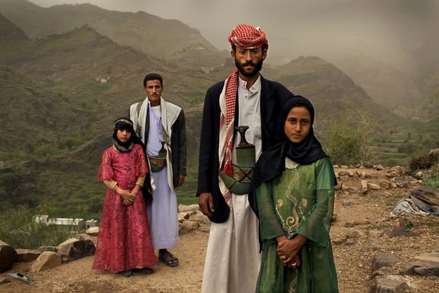 1st prize Contemporary Issues Stories: © Stephanie Sinclair, USA, VII Photo Agency for National Geographic magazine. Hajjah, Yemen, 10 June 2010 .  Tahani (in pink), who married her husband Majed when she was 6 and he was 25, poses for this portrait with former classmate Ghada, also a child bride, outside their mountain home in Hajjah. Nearly half of all women in Yemen were married as children.