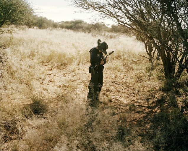 young hunter # II, kalahari, northern cape, south africa-from the series 'hunters'-David Chancellor