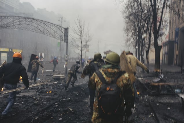 Сlashes between riot police and protesters during the attempting to block Verhovna Rada on Khreschatyk street. In 20 minutes snipers opened fire. Kiev, Feb. 20, 2014