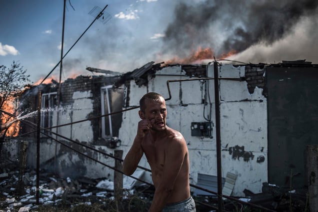 A citizens in the village of Luhanskaya after the air attack