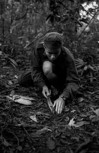 © Sarbil Olivier (Thailand) Planting land mines around the base camp of the KNLA (Karen National Liberation Army), Burma. Honorable Mention, LensCulture Exposure Awards 2009
