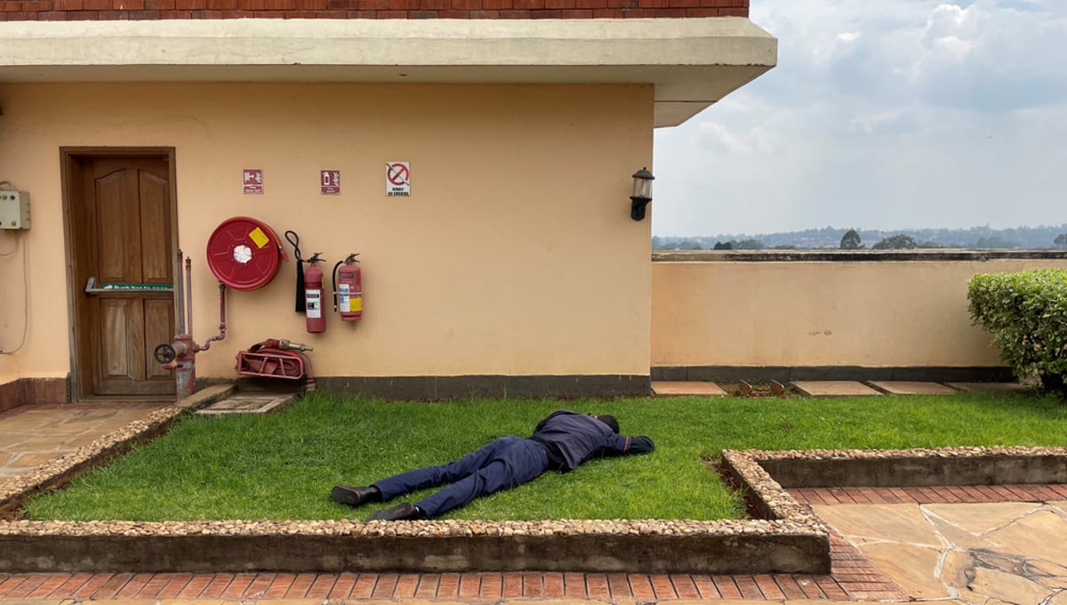 A worker rests during lunchbreak on the rooftop of an office building in Nairobi, the capital city of Kenya on January 10, 2024.