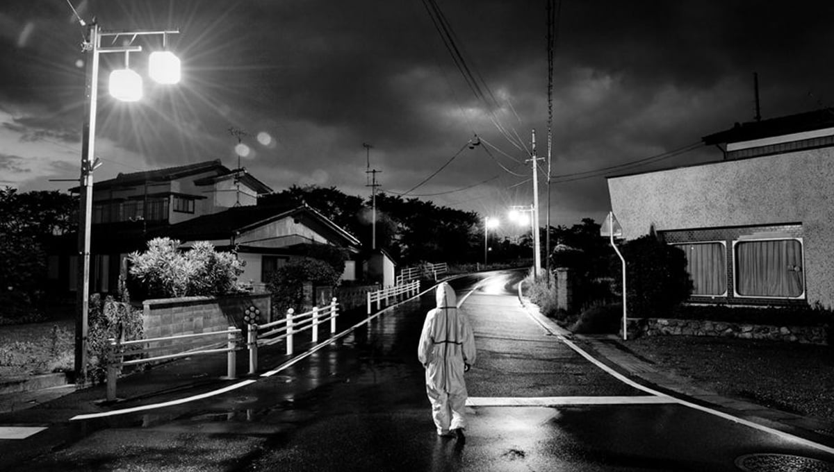 Animal activist in search of abandoned animals in Odaka city, from the series Fukushima "No Go" Zone, © Pierpaolo Mittica.