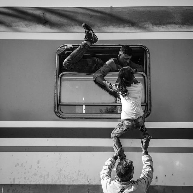 Hundreds of refugees pour onto trains in Tovarnik, Croatia.