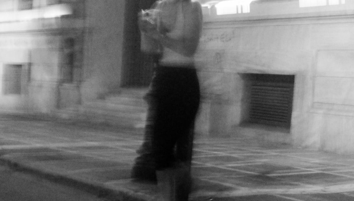 Night Street Photography - blurred figures in our mysterious city