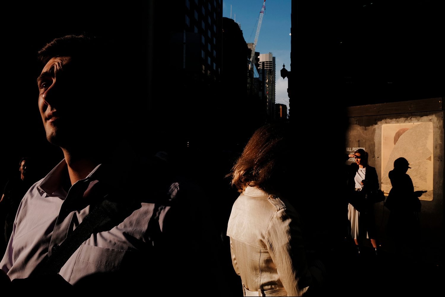 Untitled. Corralled on street corners but never connected, commuters begin the journey home. During peak hour, each corner on Sydney’s main thoroughfare of George Street is packed with pedestrians in a mass exodus of the CBD. © Sam Ferris