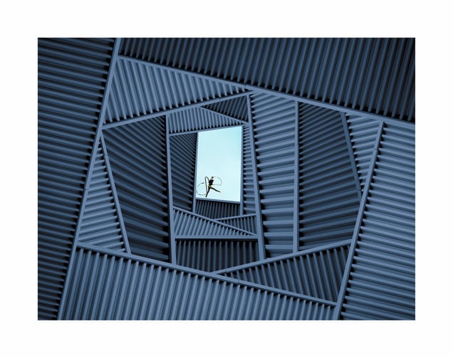 BETWEEN SPACE AND MOVEMENT