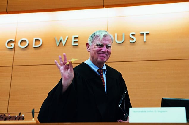 Judge + US motto: “In God we trust”