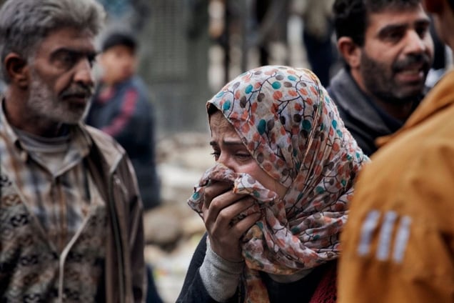 A woman cries outside a hospital in Aleppo on February 11, 2013. © Nish Nalbandian